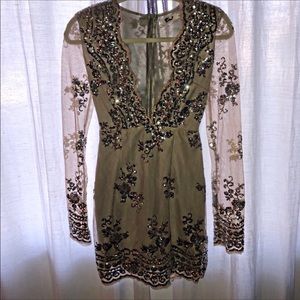 Mini long sleeve sequence sheer low cut dress
